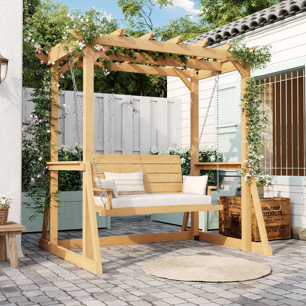 Wooden swing with a canopy in a garden setting