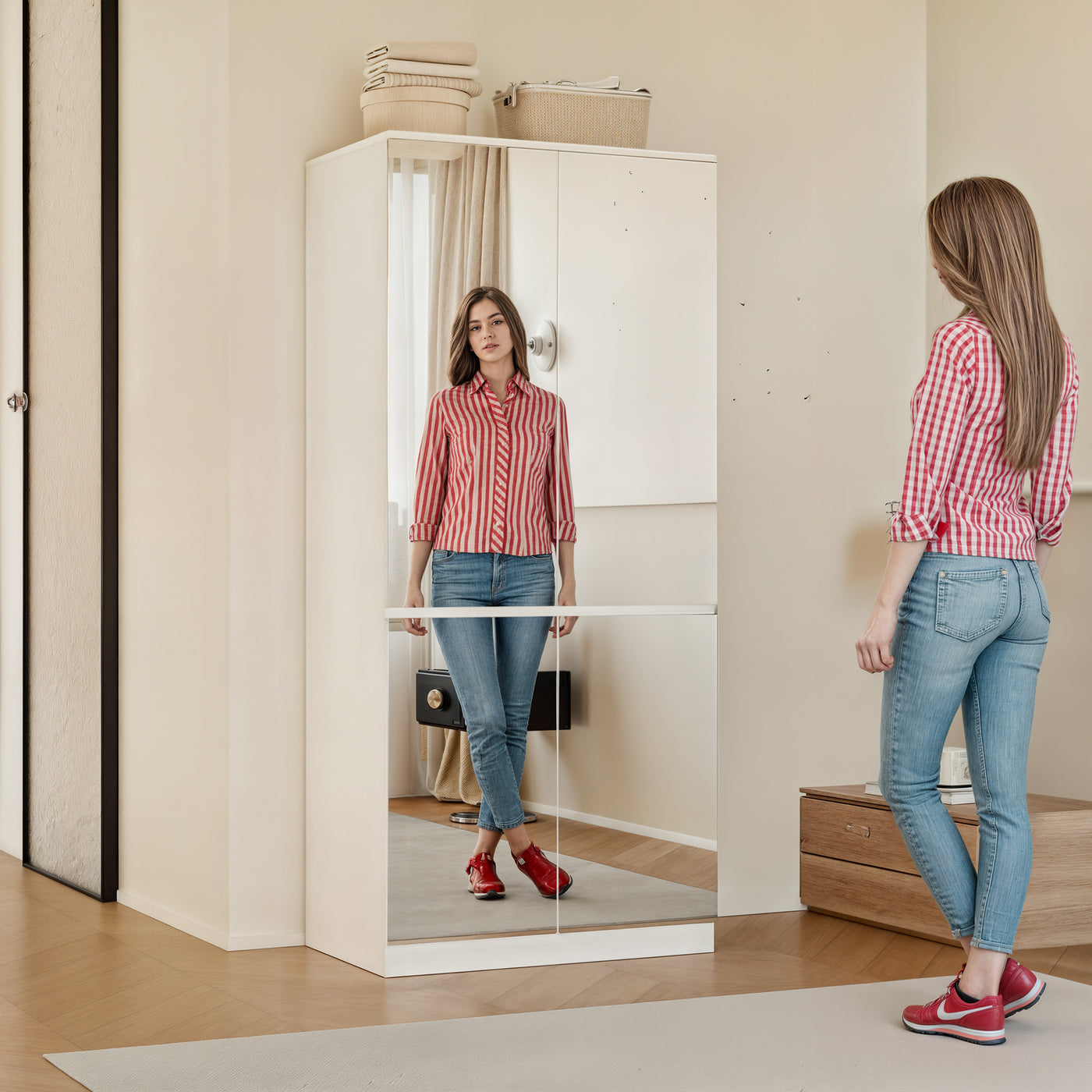 White armoire with mirrored doors and cabinet storage