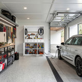 White garage storage cabinet with countertop, tool wall, and lower doors