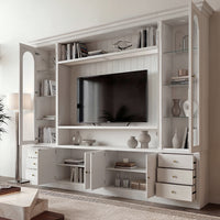 White entertainment center with open TV space, glass side cabinets, lower storage cabinets, and drawers