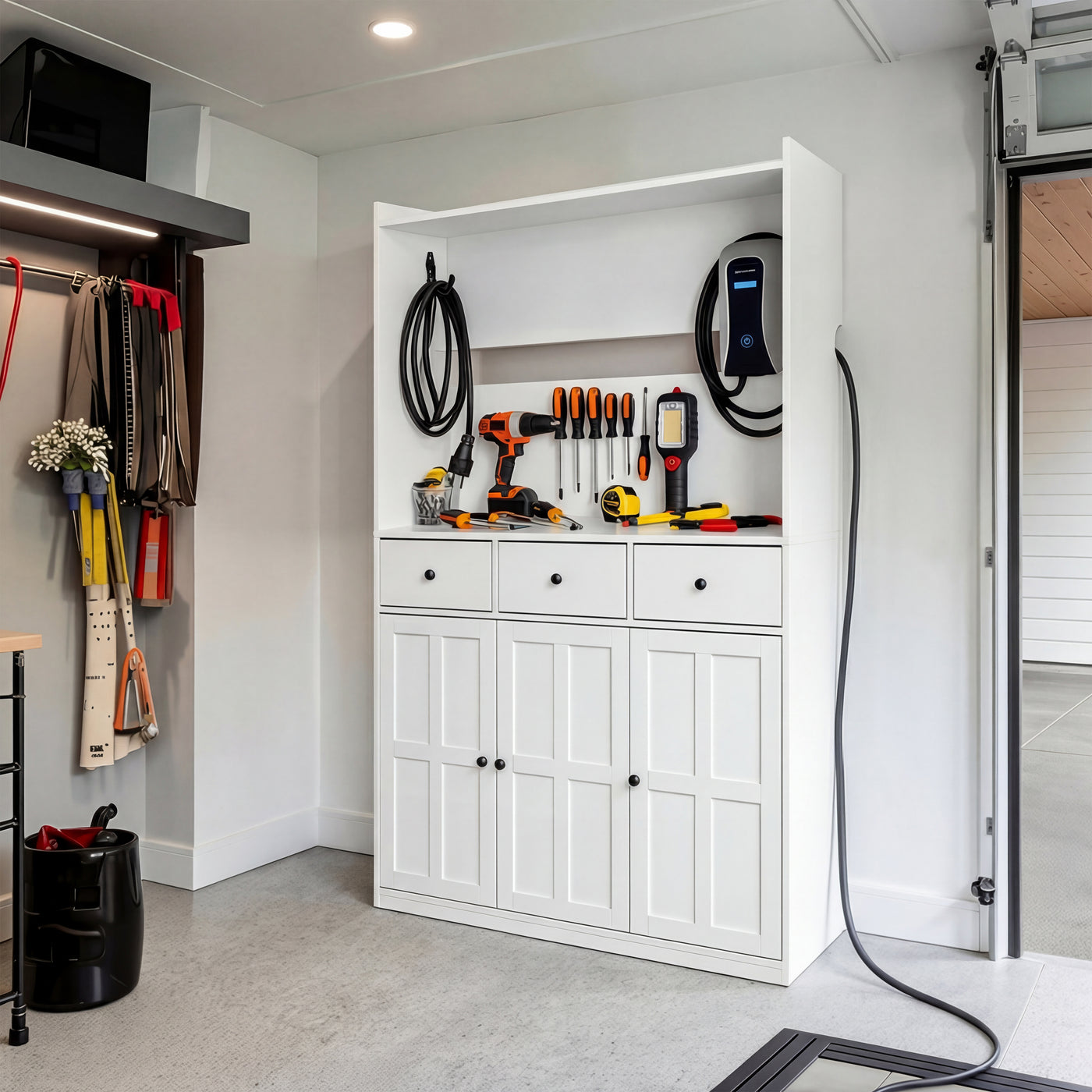 White garage storage cabinet with countertop, tool wall, and lower doors