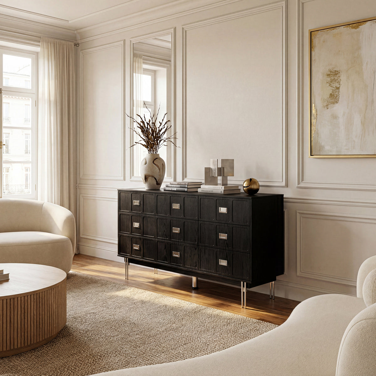 Modern black dresser with silver handles and metal legs