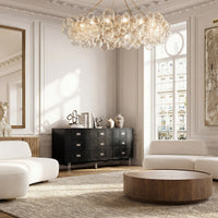 Modern black dresser with silver handles and metal legs
