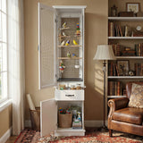 Small birdcage with birds inside in a room with a bookshelf and chair.