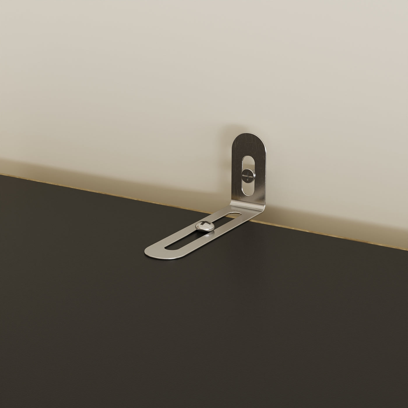 Metal bracket on a wall junction box with a neutral background