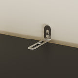 Metal bracket on a wall junction box with a neutral background