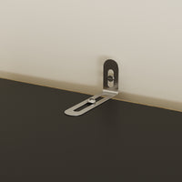 Metal bracket on a wall junction box with a neutral background